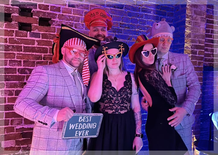 Guests using the Star Eventz Photo Booth at a Wedding in Loughborough
